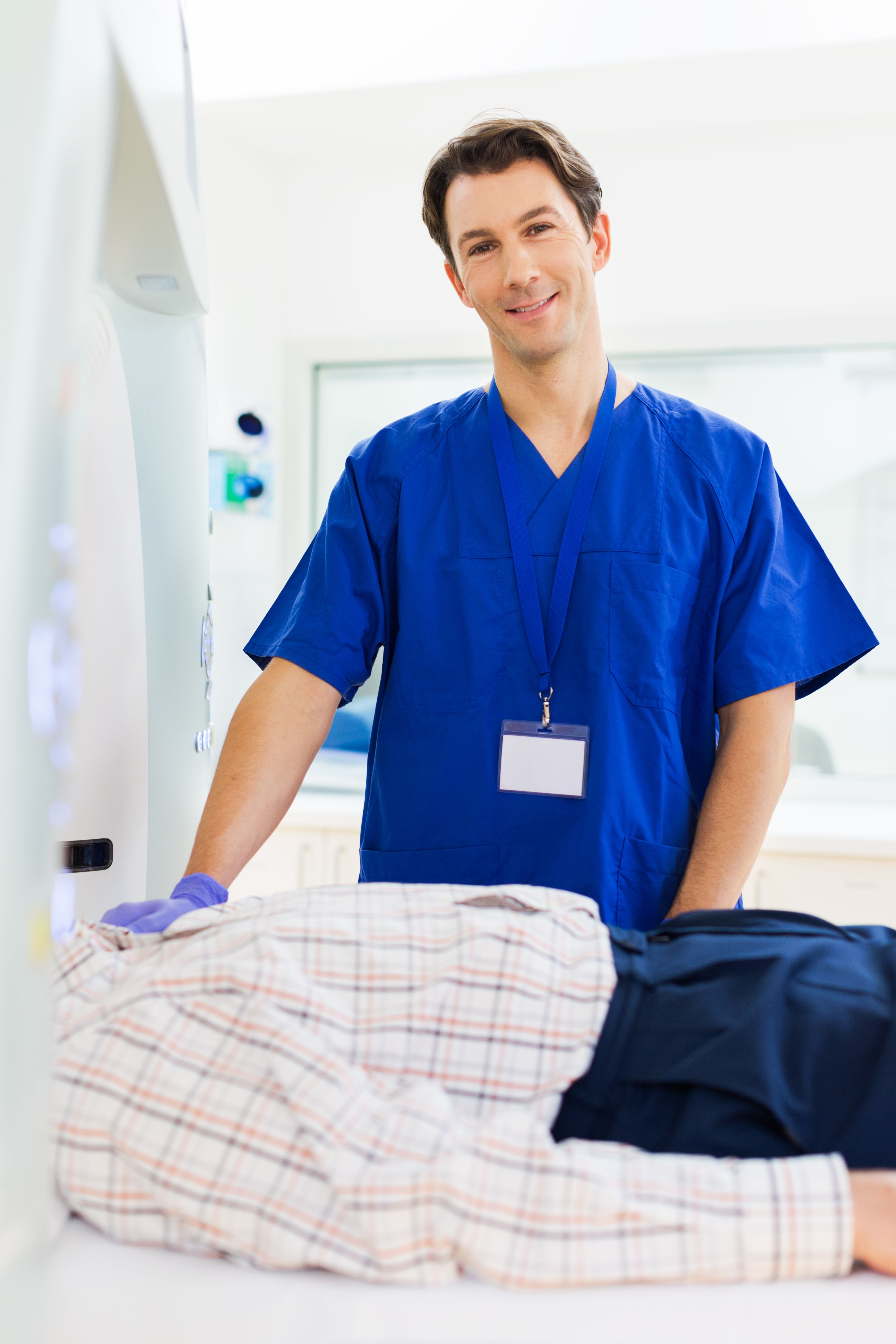 man standing near to tree