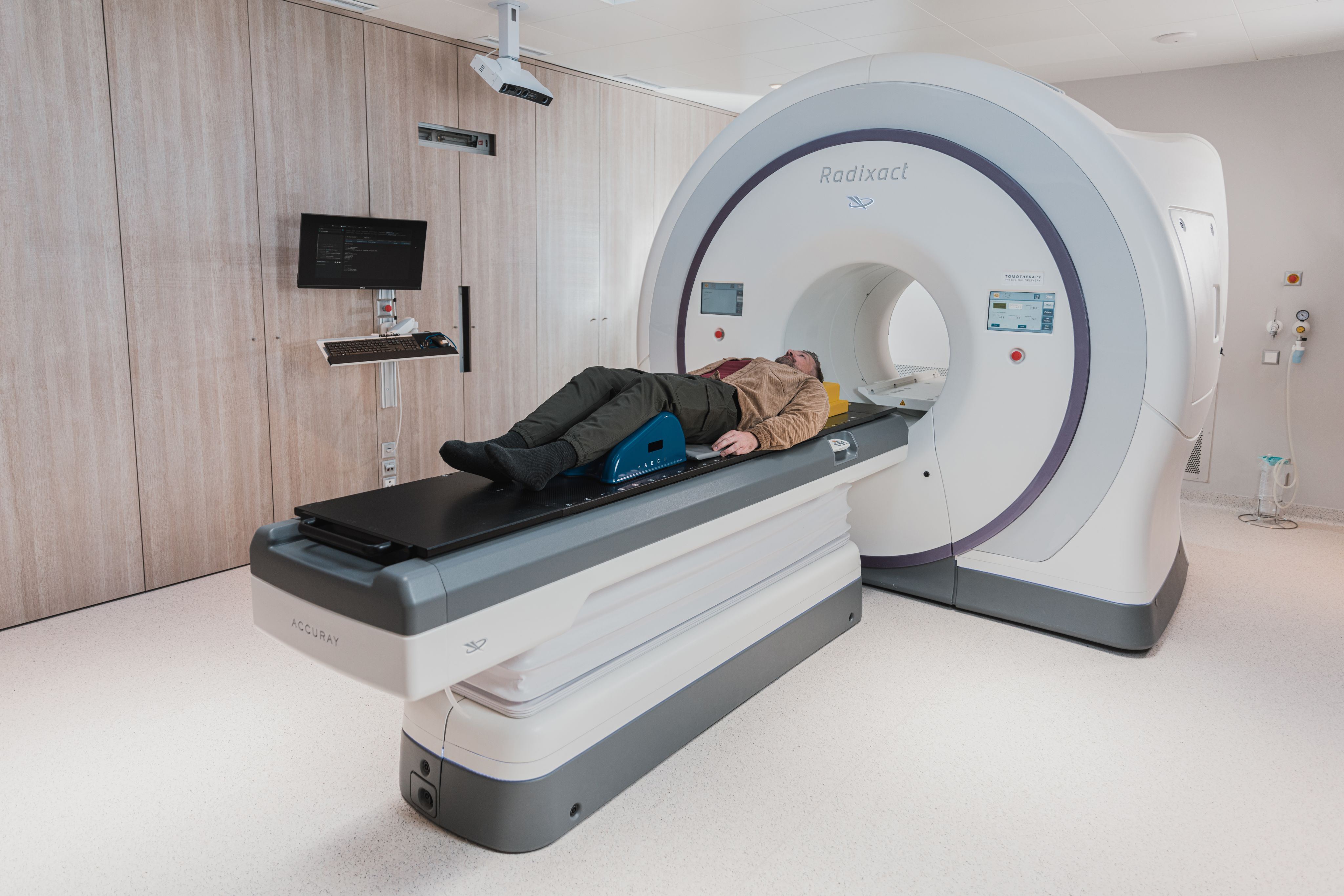 a person lying on a MRI Scanner