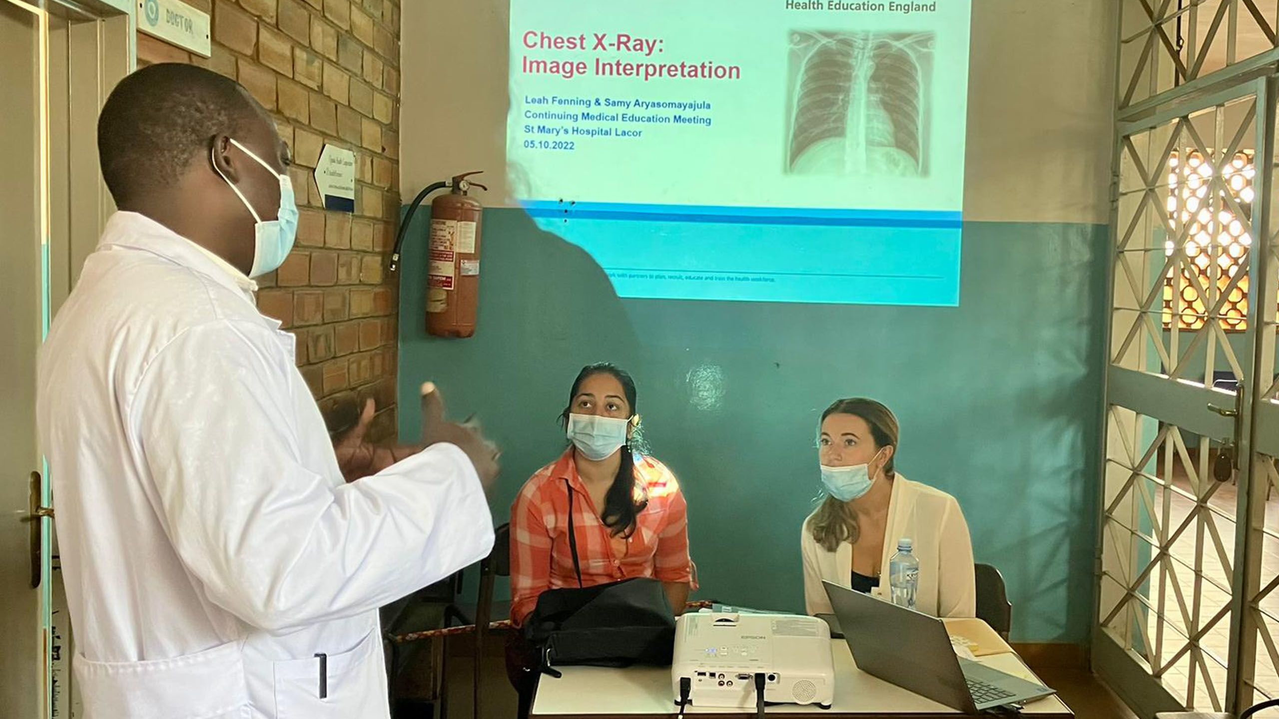 Leah and colleague teaching chest X-ray interpretation