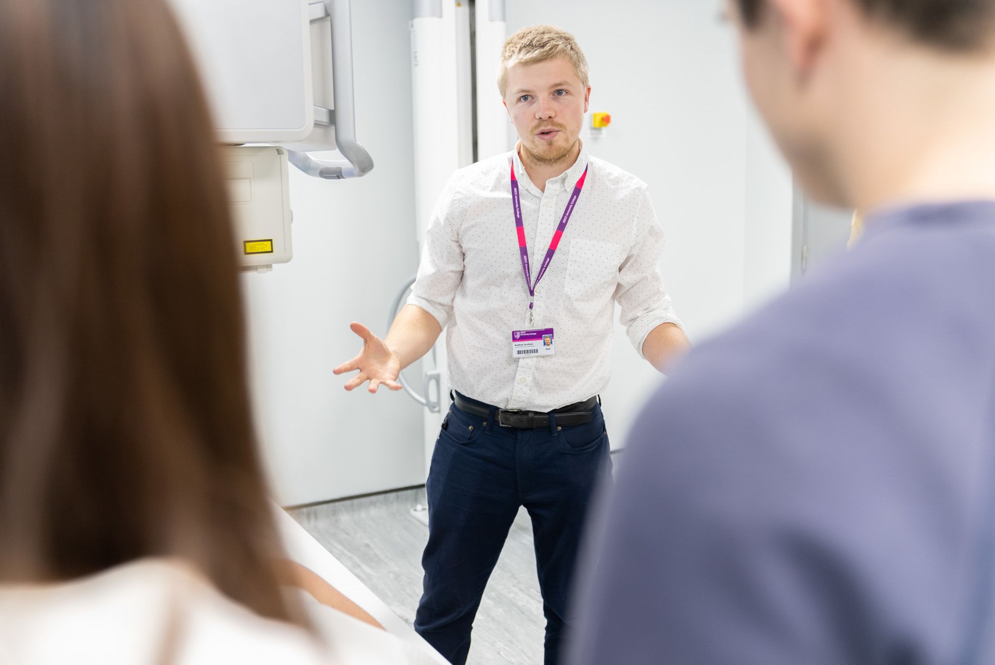 Matthew Southam talking to students