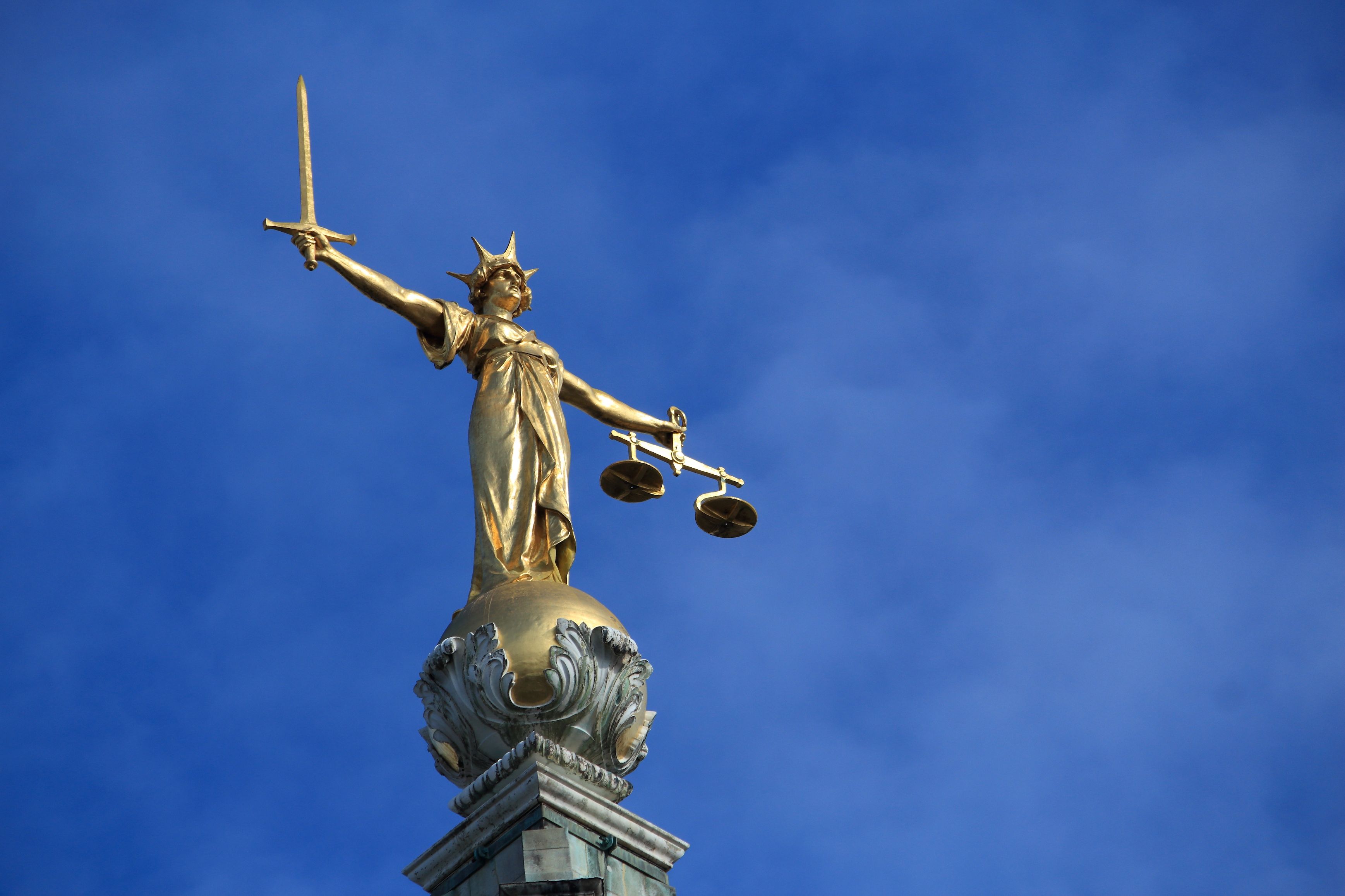 Justice statue. London, UK - Central Criminal Court also known as Old Bailey.