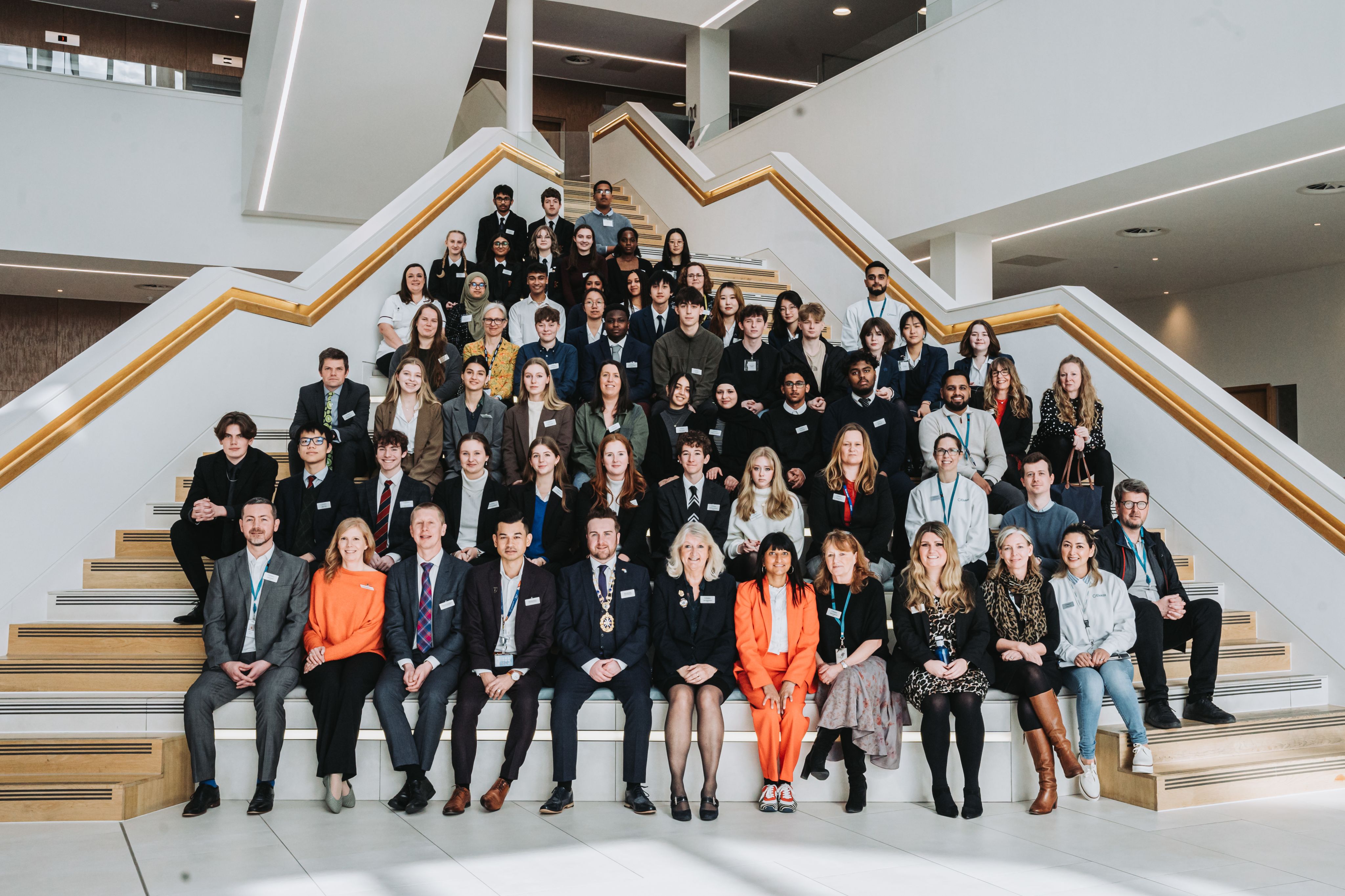 Full team picture of staff and students