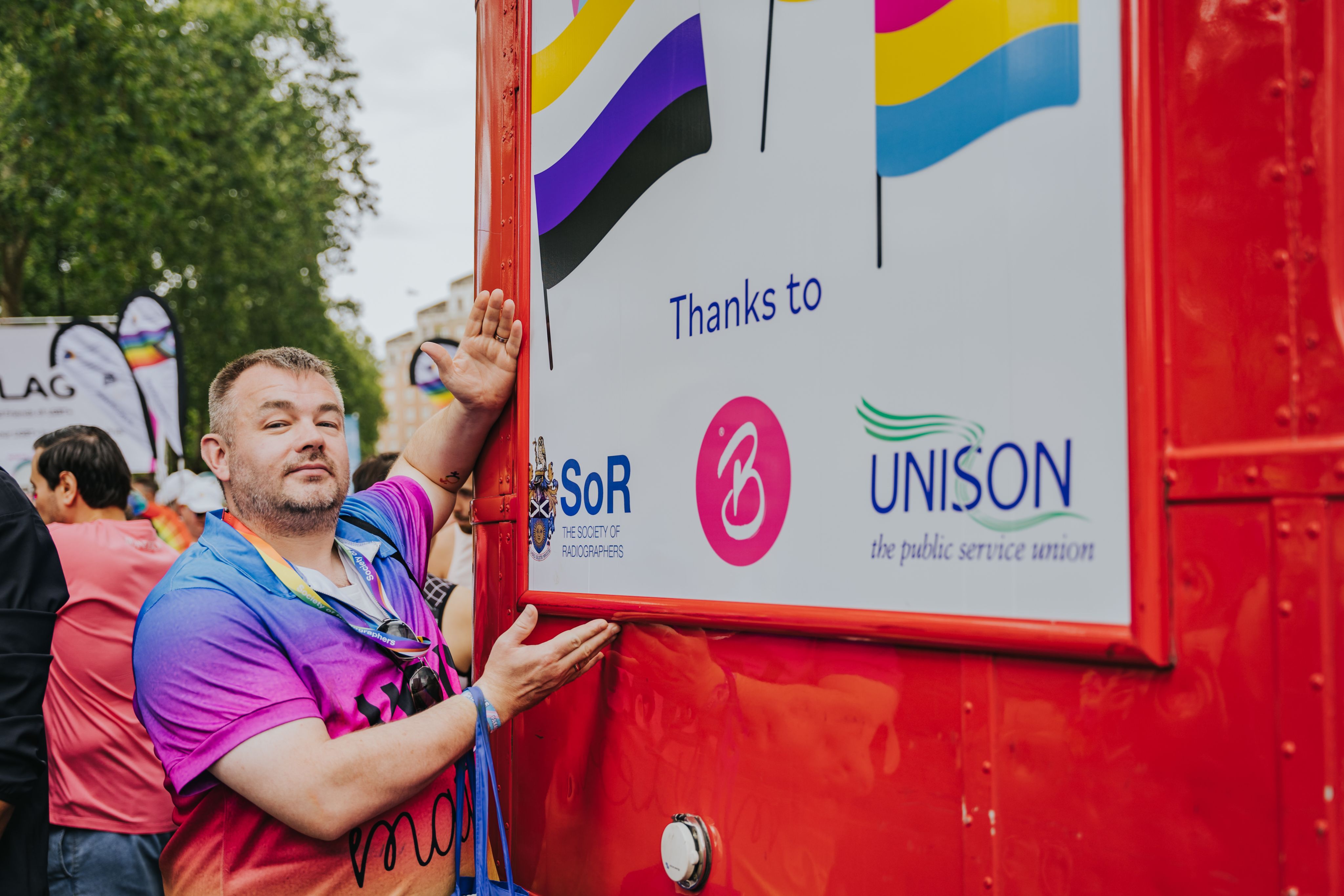 Dave pointing to the SOR on a London bus during London Pride