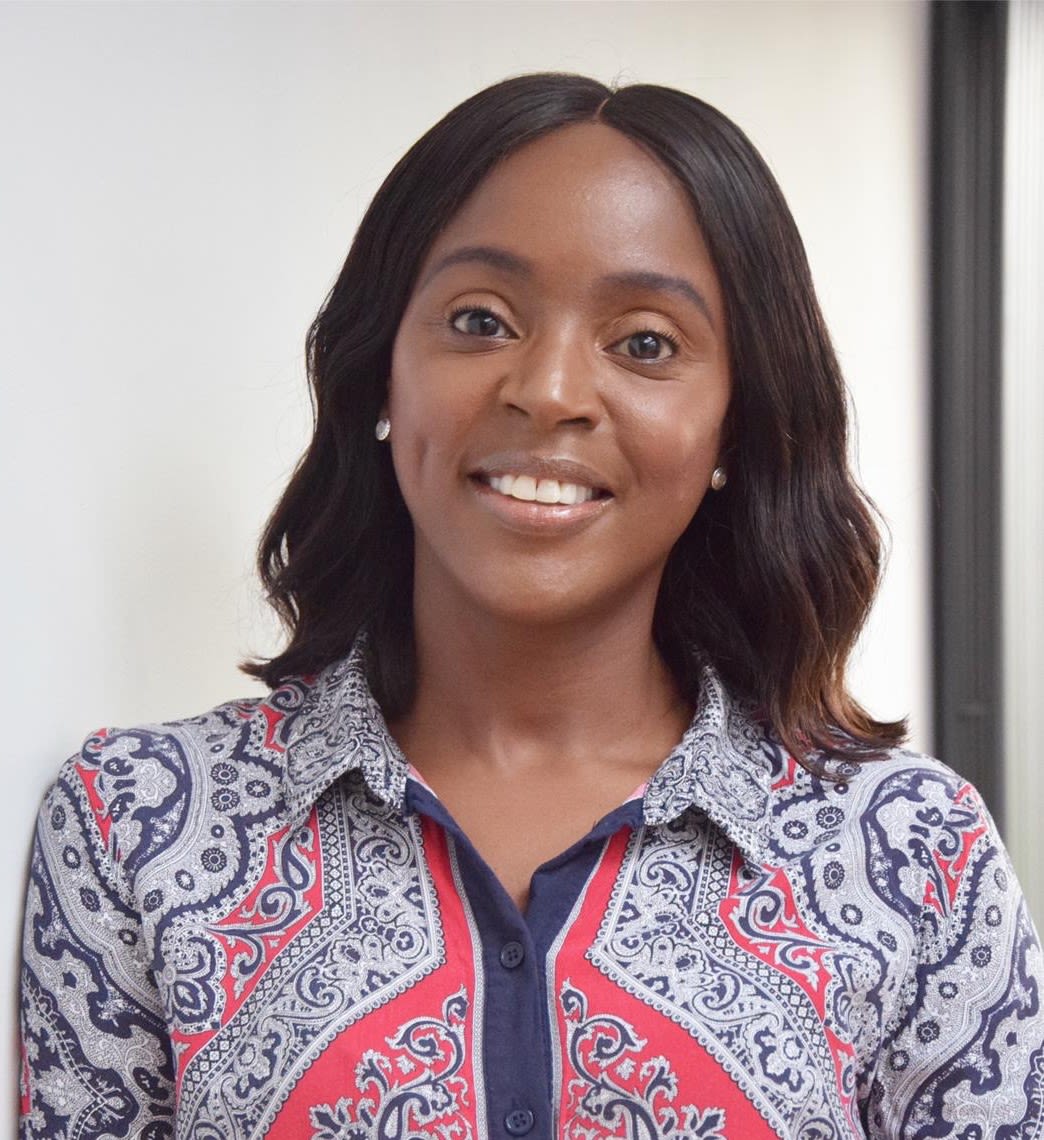 Woman interacting with desk yoga